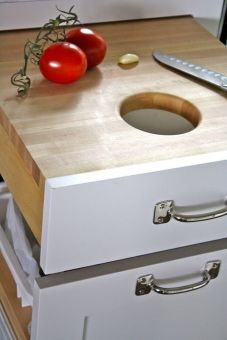 kitchen cutting board over trash bin